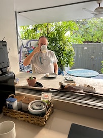 nice to have morning coffee by the open kitchen window