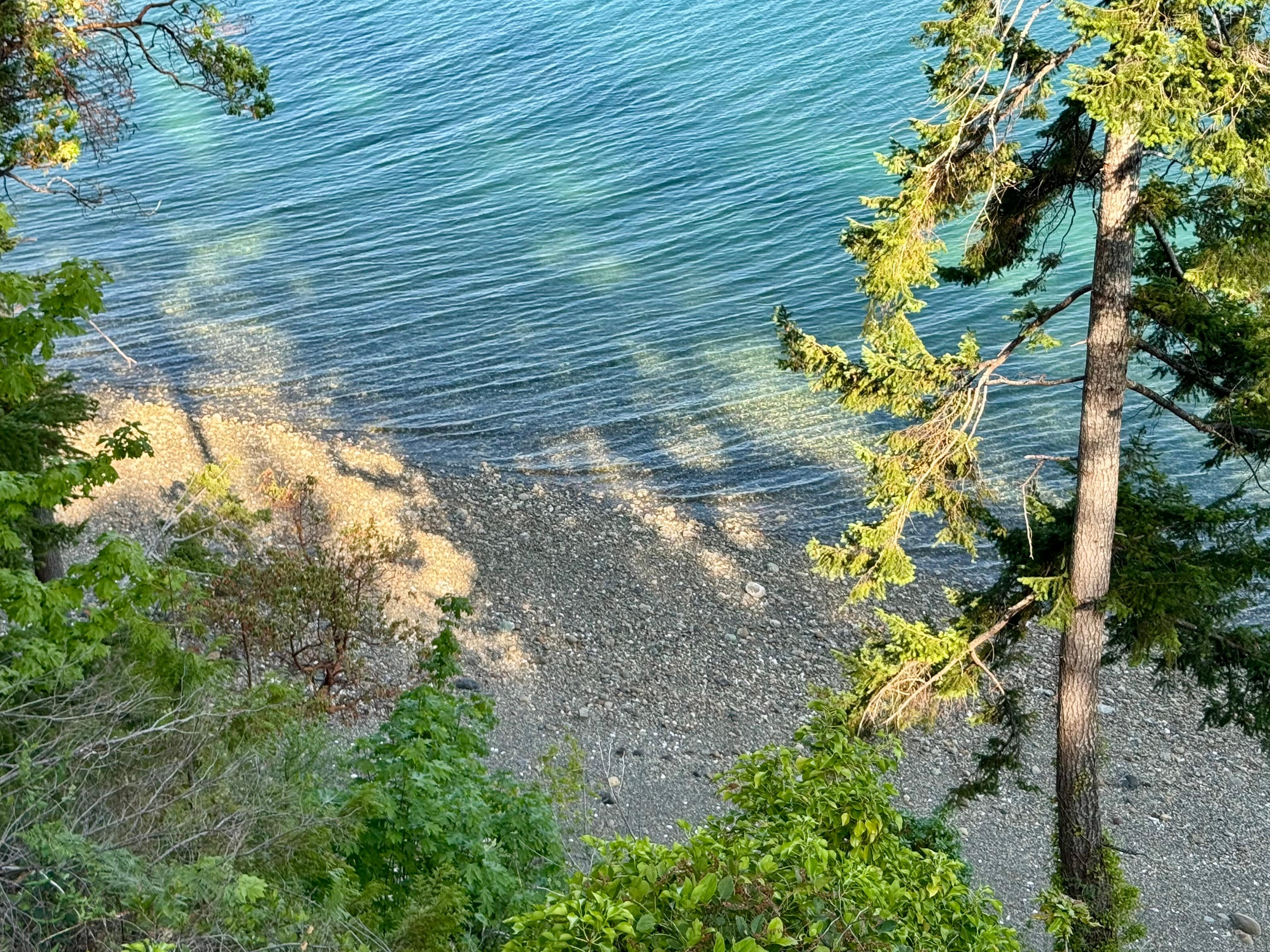 High tide on beach below house