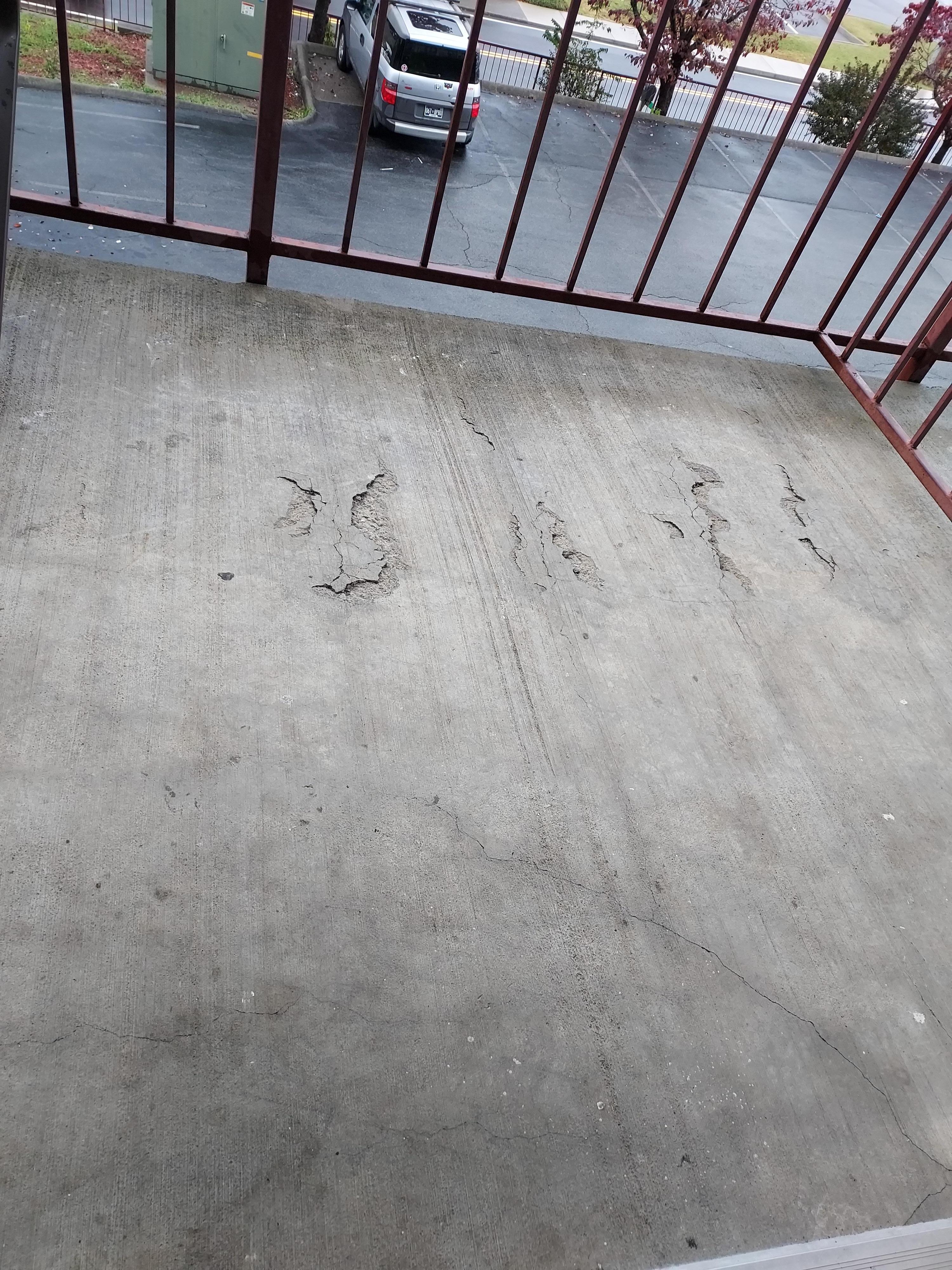 Broken concrete on the balcony