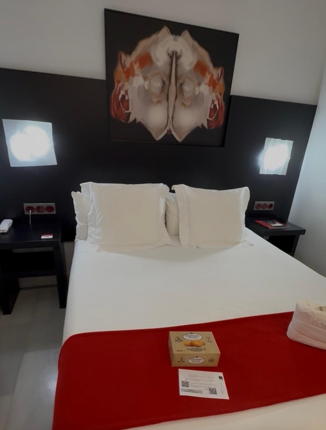 
This was such a warm and friendly room with complementary water and cookies on the bed.