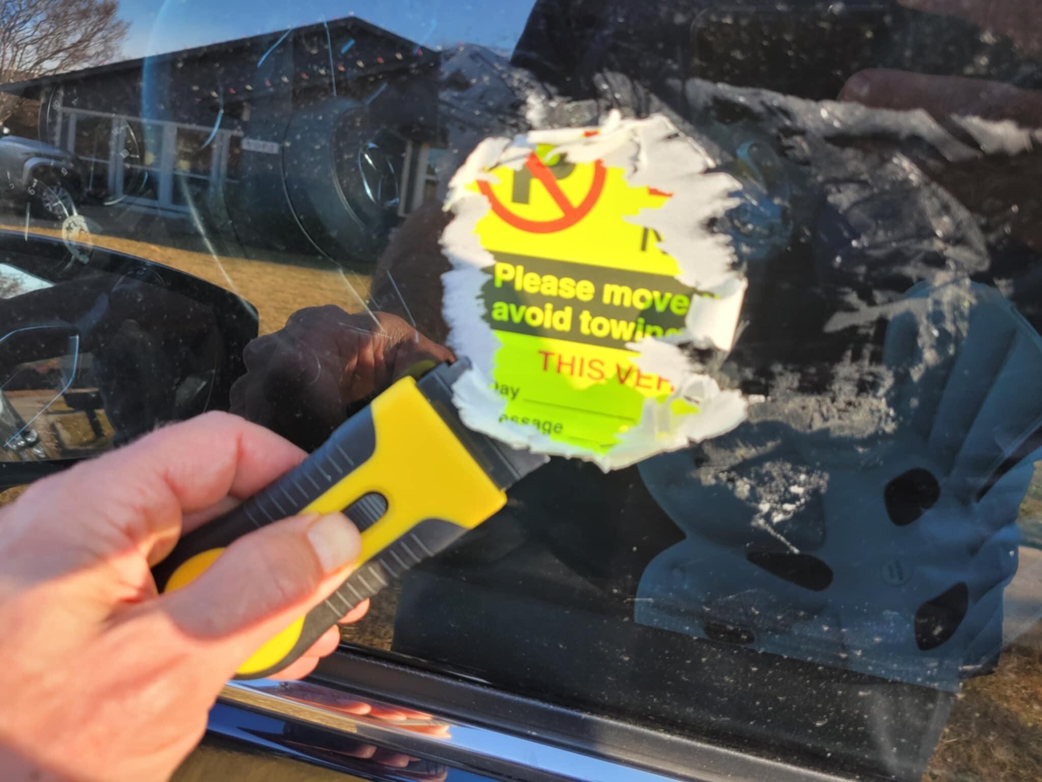 Dollar Store scraper to remove annoying 10" x 8" sticker left by Barney Fife