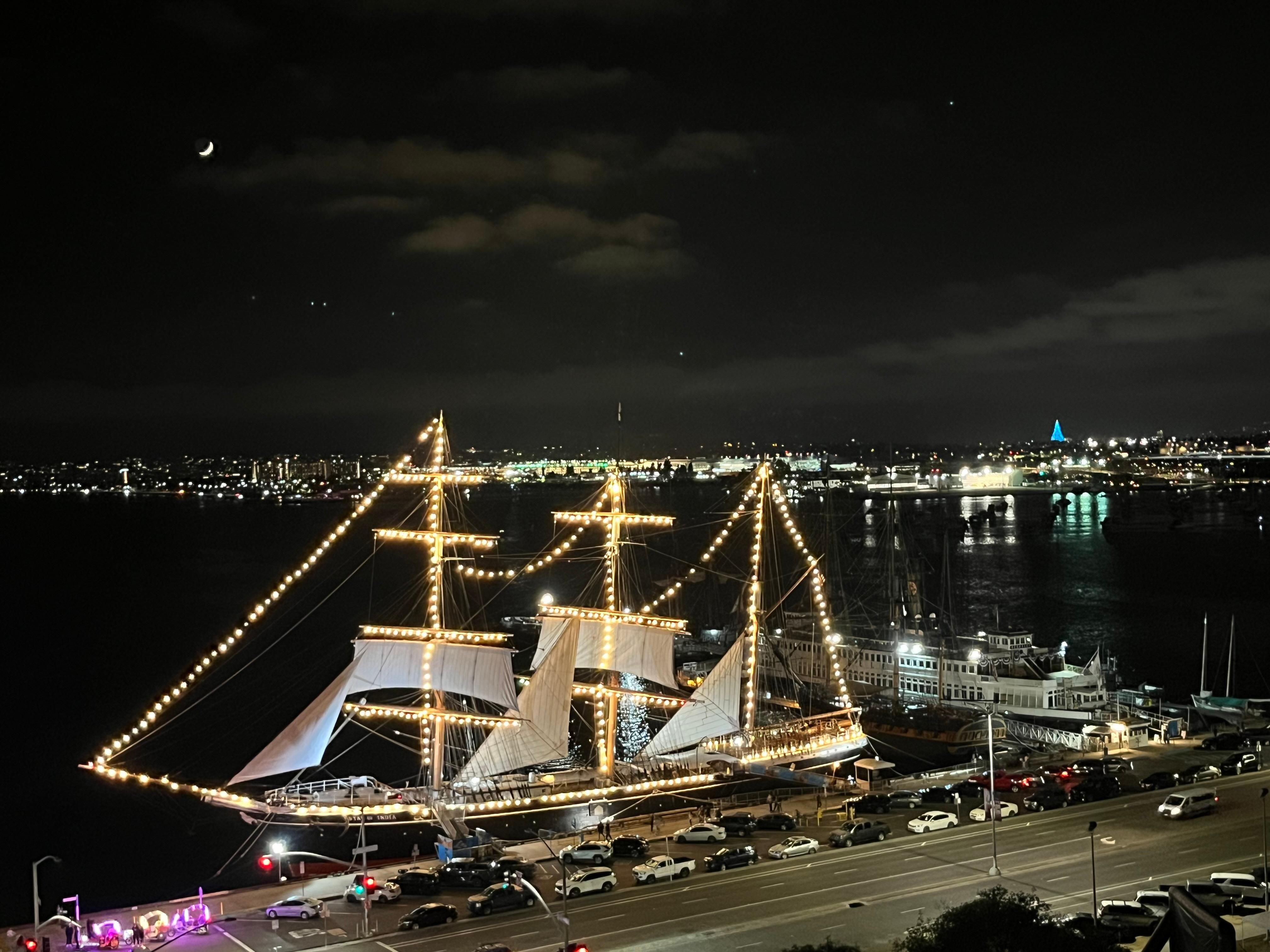 View at night, star of India lit up. 