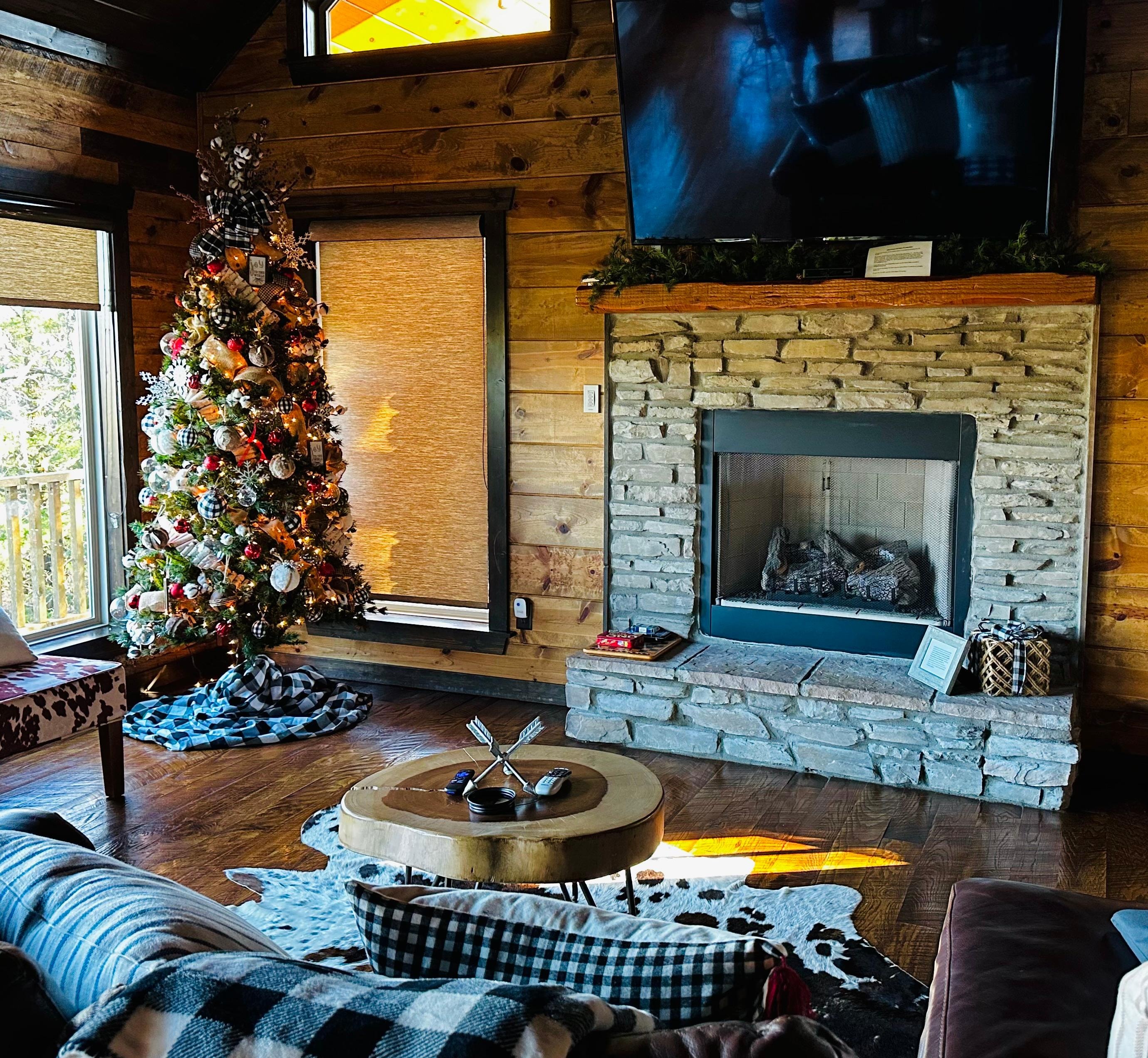 Beautiful living area with a very nice Xmas tree set up
