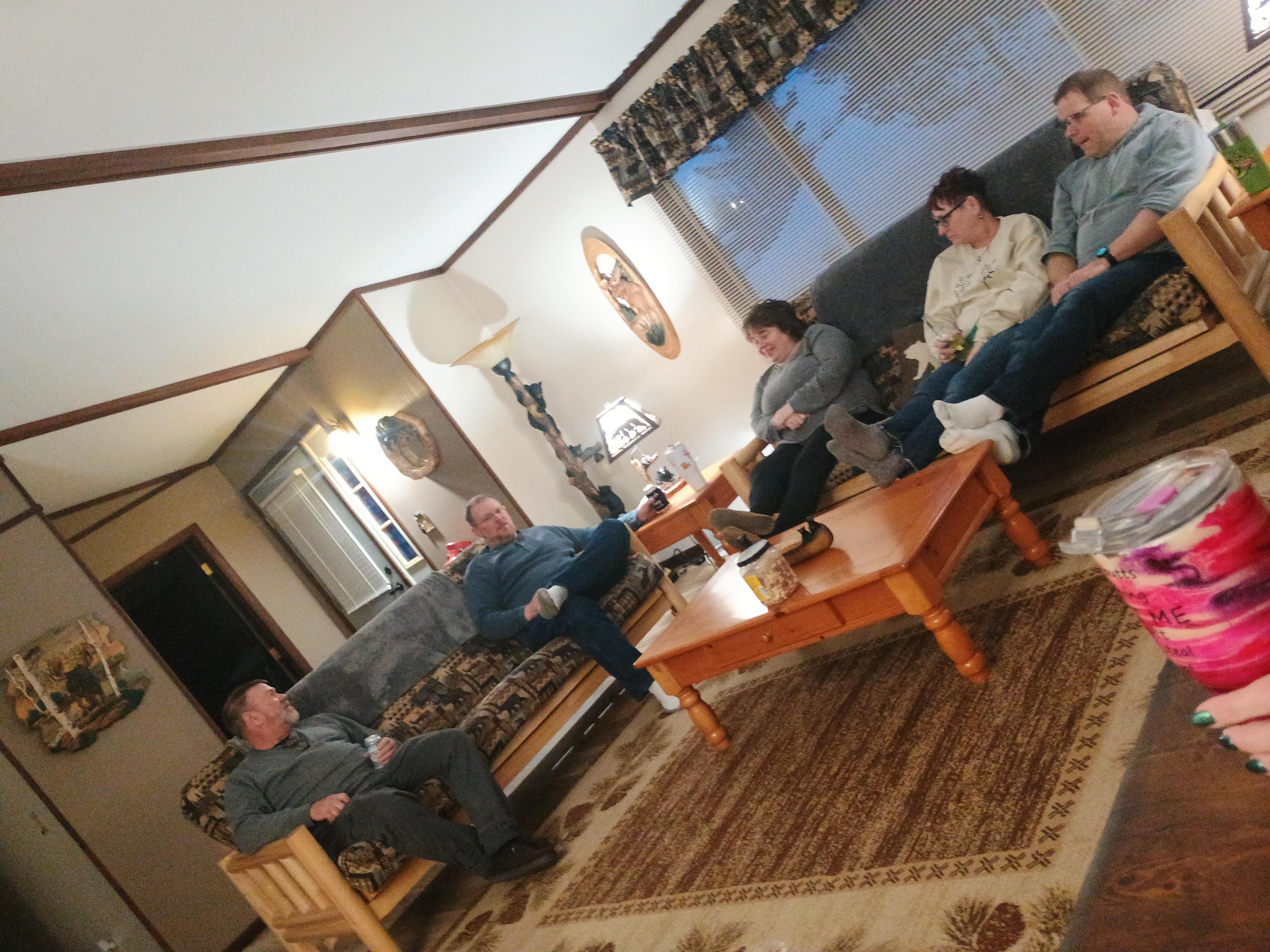 Sitting around talking about our 5 Mile snowshoe walk. 