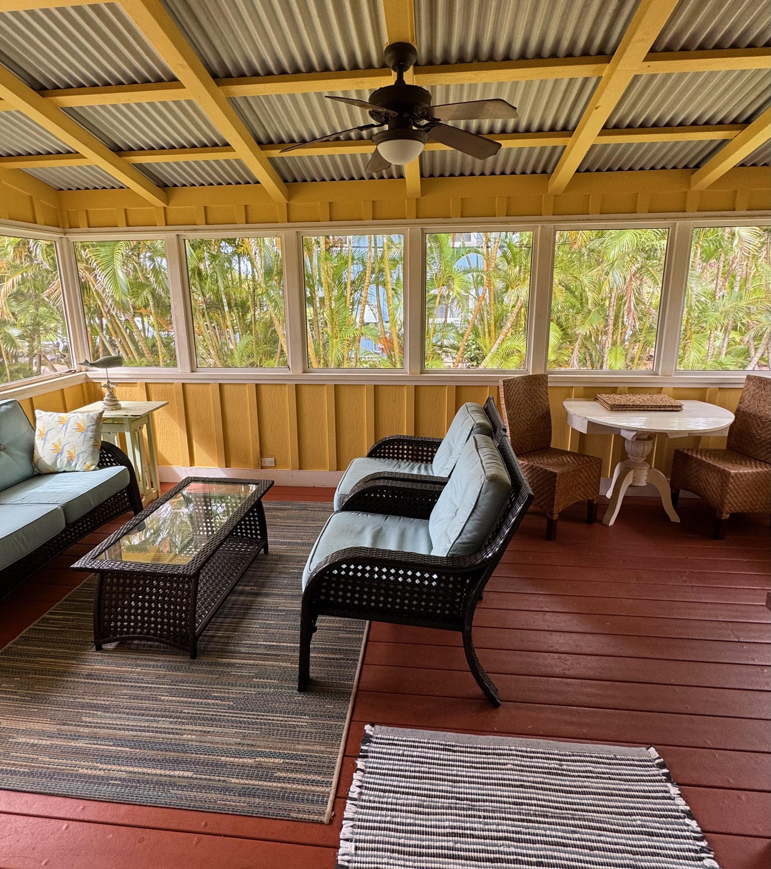 Fully enclosed sunroom with screened windows - very pleasant place to relax