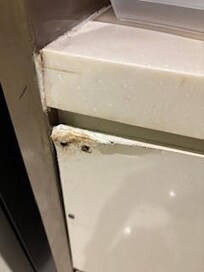 Water damage on kitchen cabinets