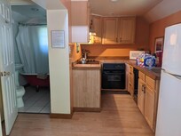 Well-equipped kitchenette and bathroom.