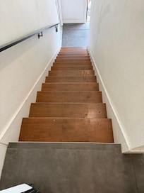 Dirty sticky steps to second floor.