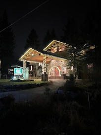The blackbear Lodge with Christmas lights on at night