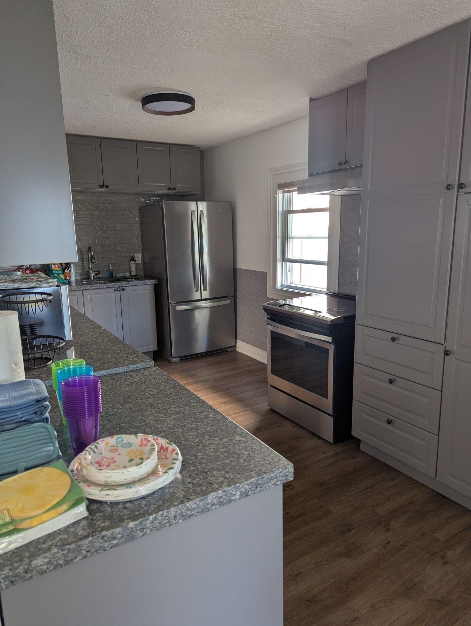 Kitchen was fully equipped with oven, toaster, kettle, pots and pans