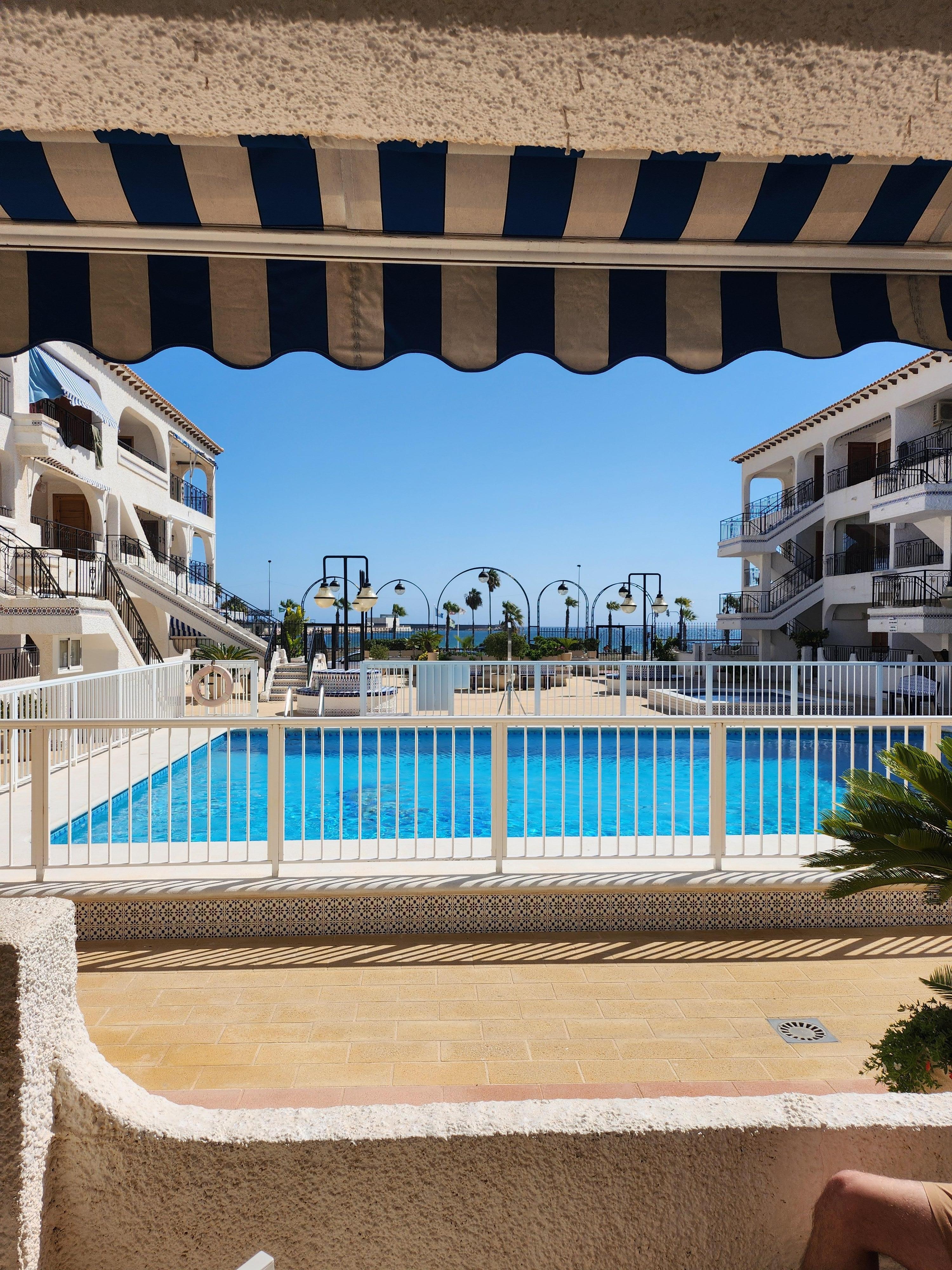 Pool only feet from the door .