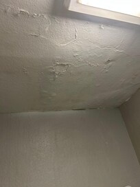 Water damage in bathroom.
