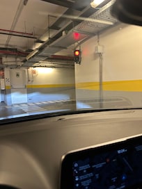 The roadway into and out of the carpark is a single lane controlled by traffic lights. When they malfunction...you are in no man's land. When the ticket that you collected to get into the car park will not let you exit....