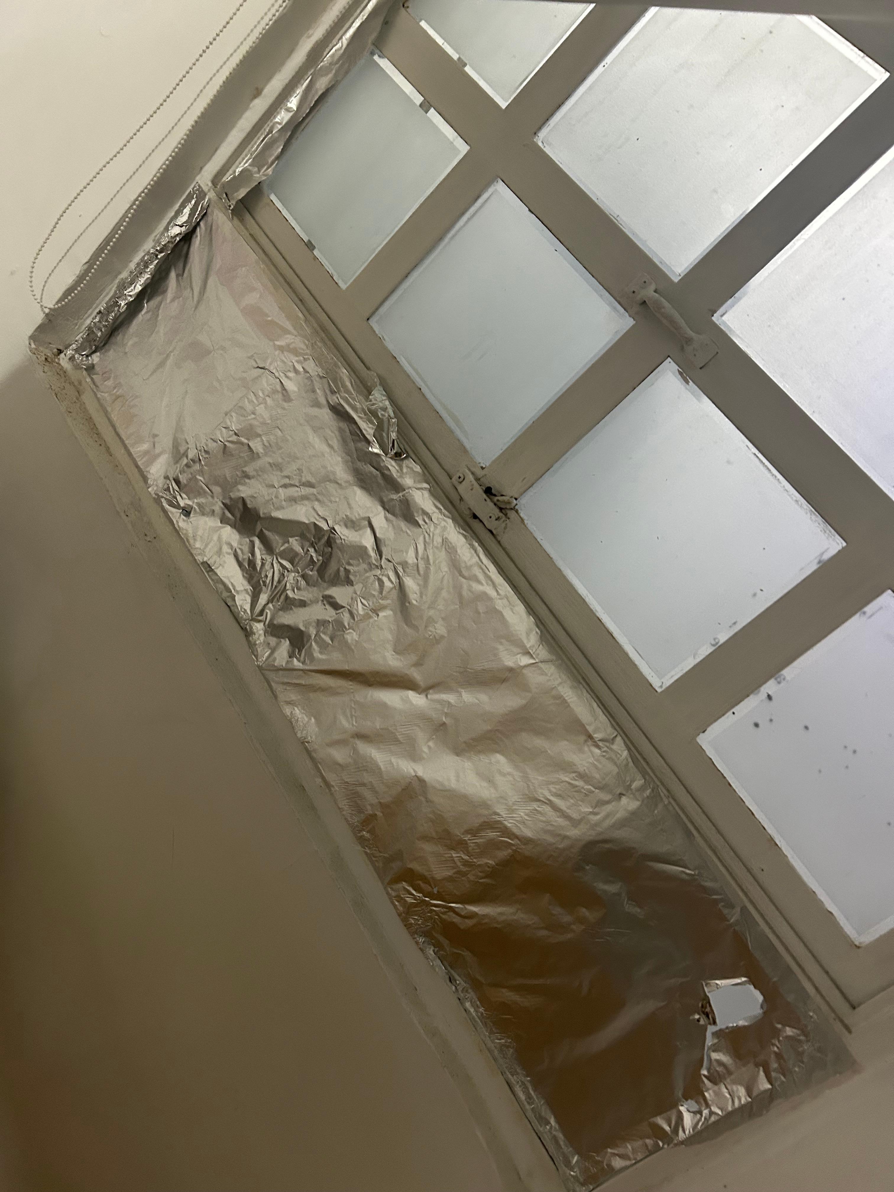 Missing window using foild paper to help gals to stay in place 