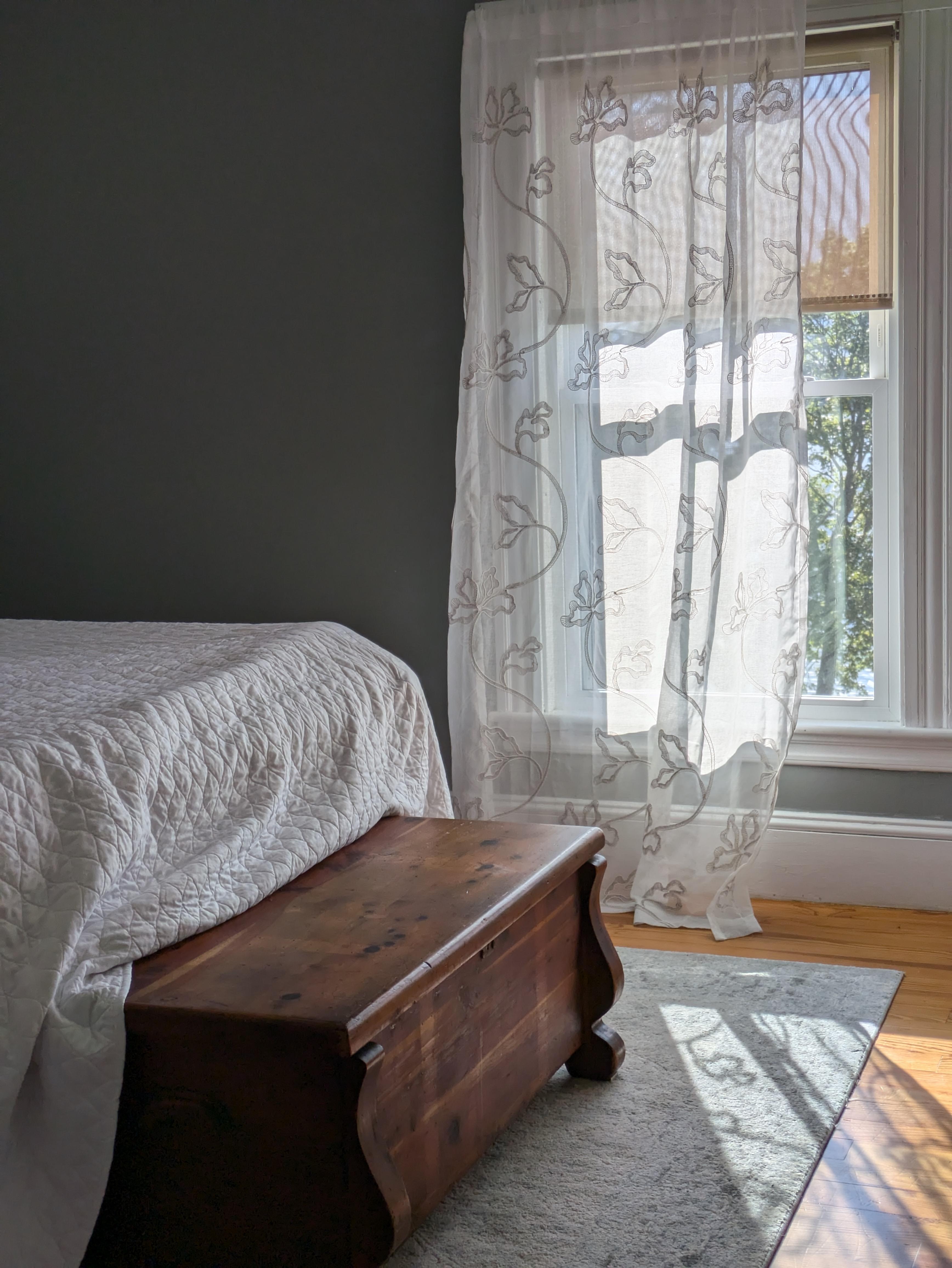 Morning light coming through upstairs bedroom window 