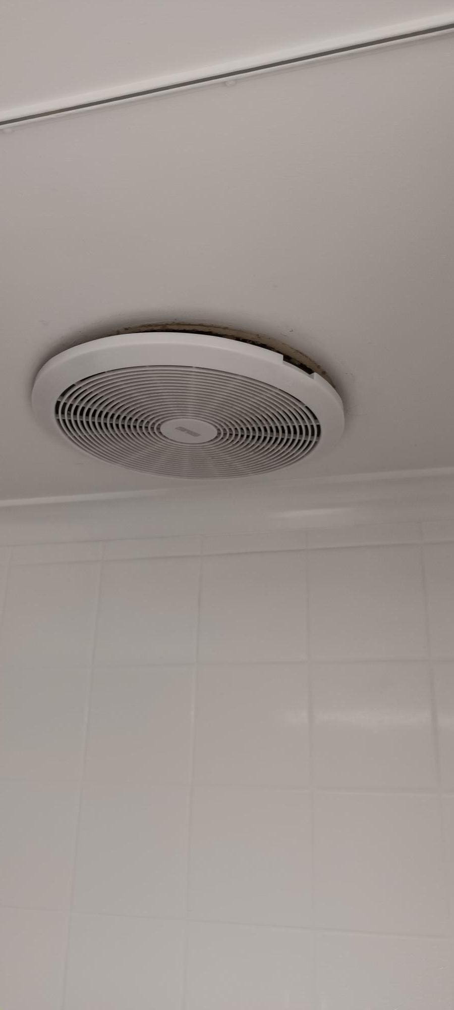 Ceiling Fan ready to fall into the bath!