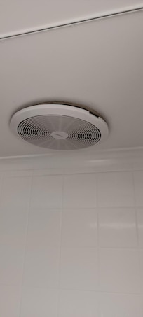 Ceiling Fan ready to fall into the bath!