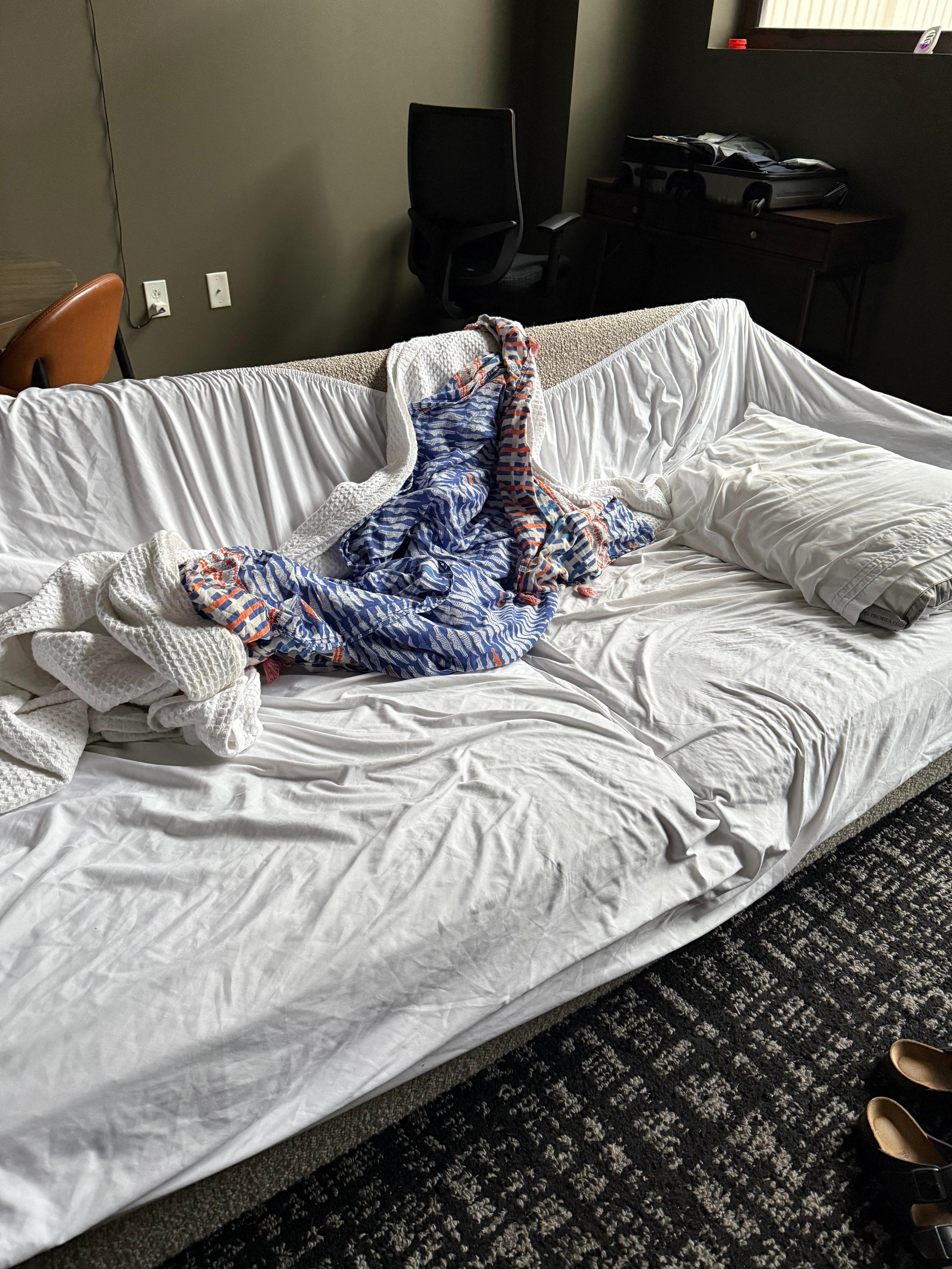 This is where I slept and used my scarf for a top sheet. Asked for another pillow case but it never arrived and the additional pillow was stained with makeup so no thanks 