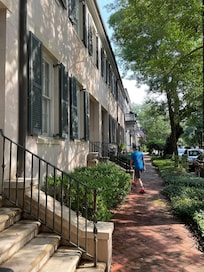 My husband walking up the front steps.