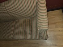 Drug addicts bloody stained couch