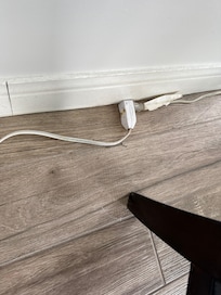 This is the extension cord that the lamp is plugged into and as you can see, it is fried like it had been an electrical fire