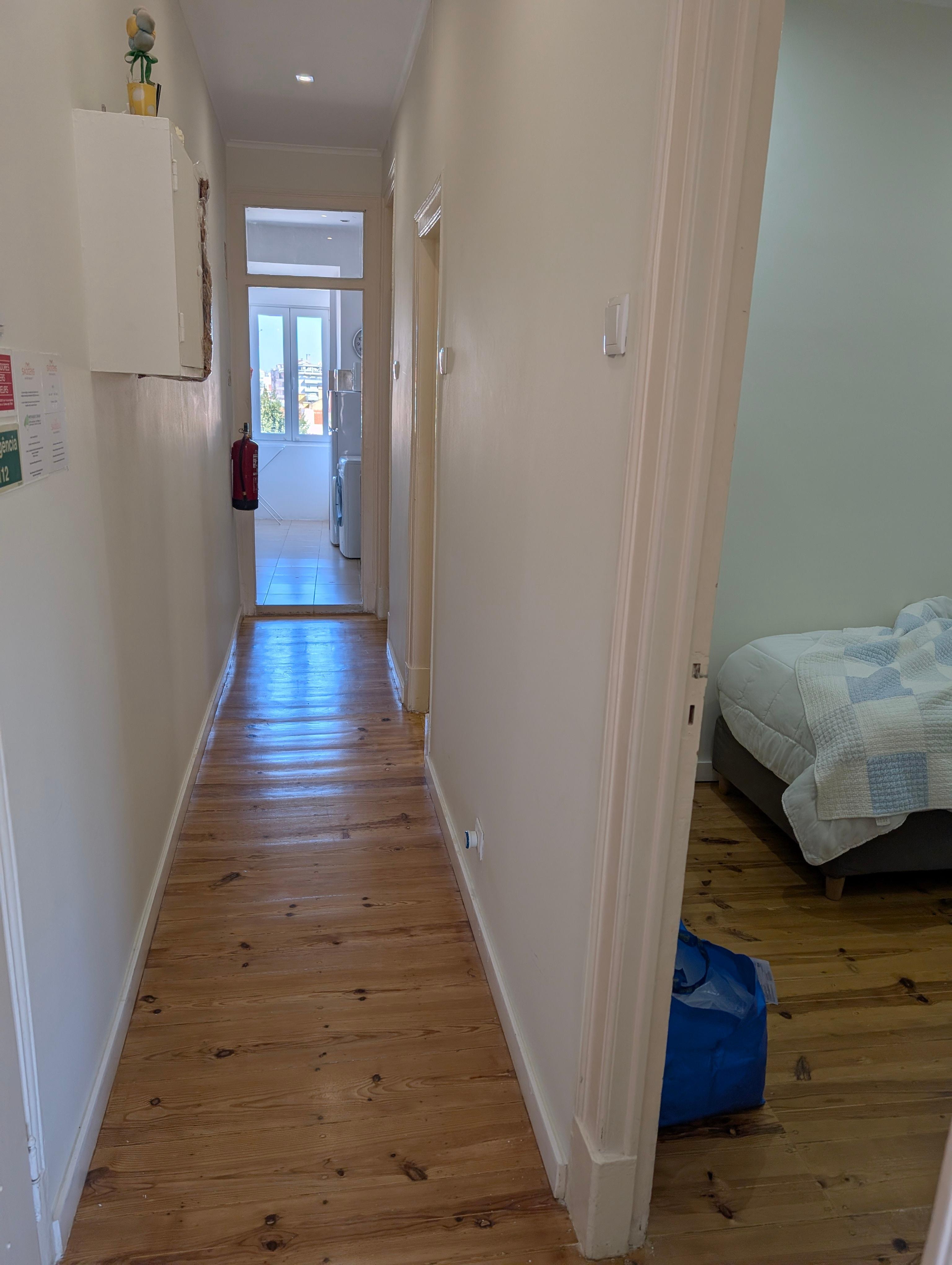 hall to kitchen and primary bedroom