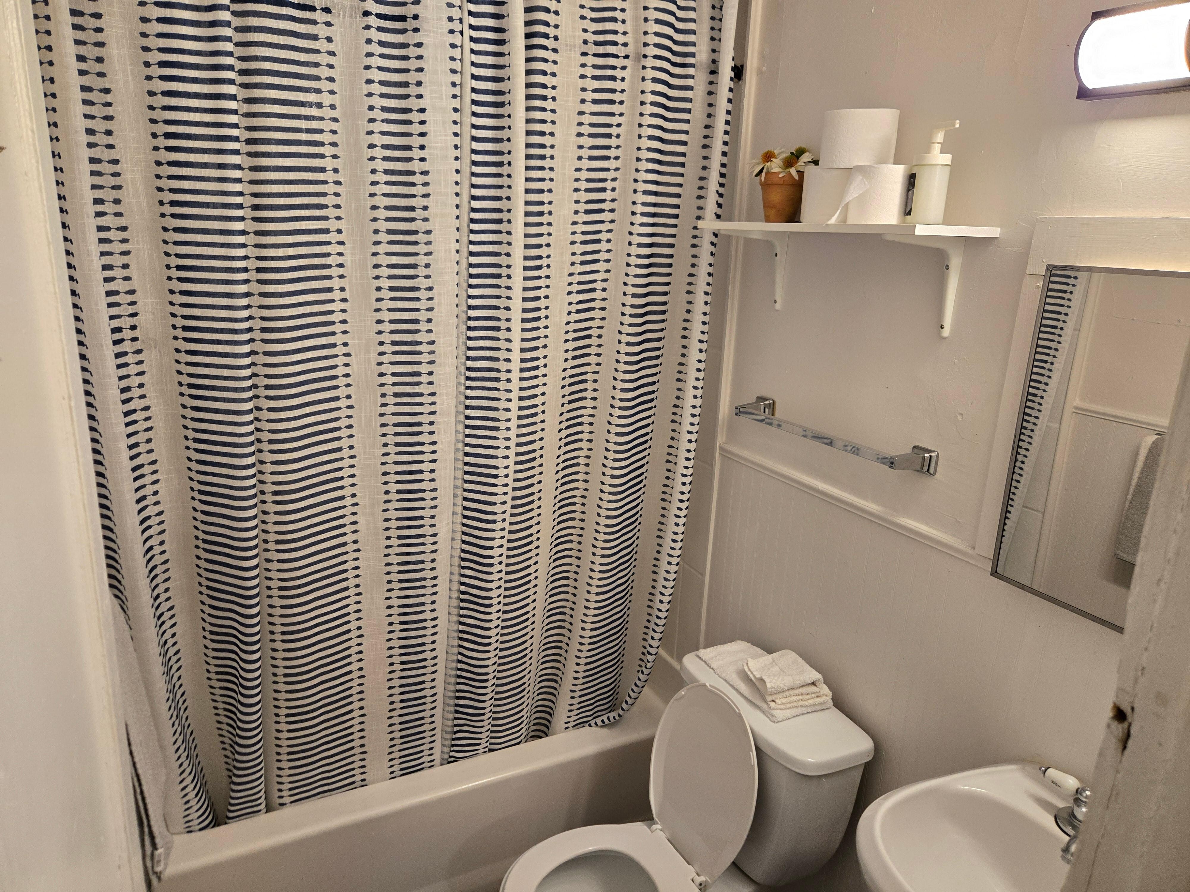 Bathroom had great shower, recommend another shelf for toiletry kit maybe.