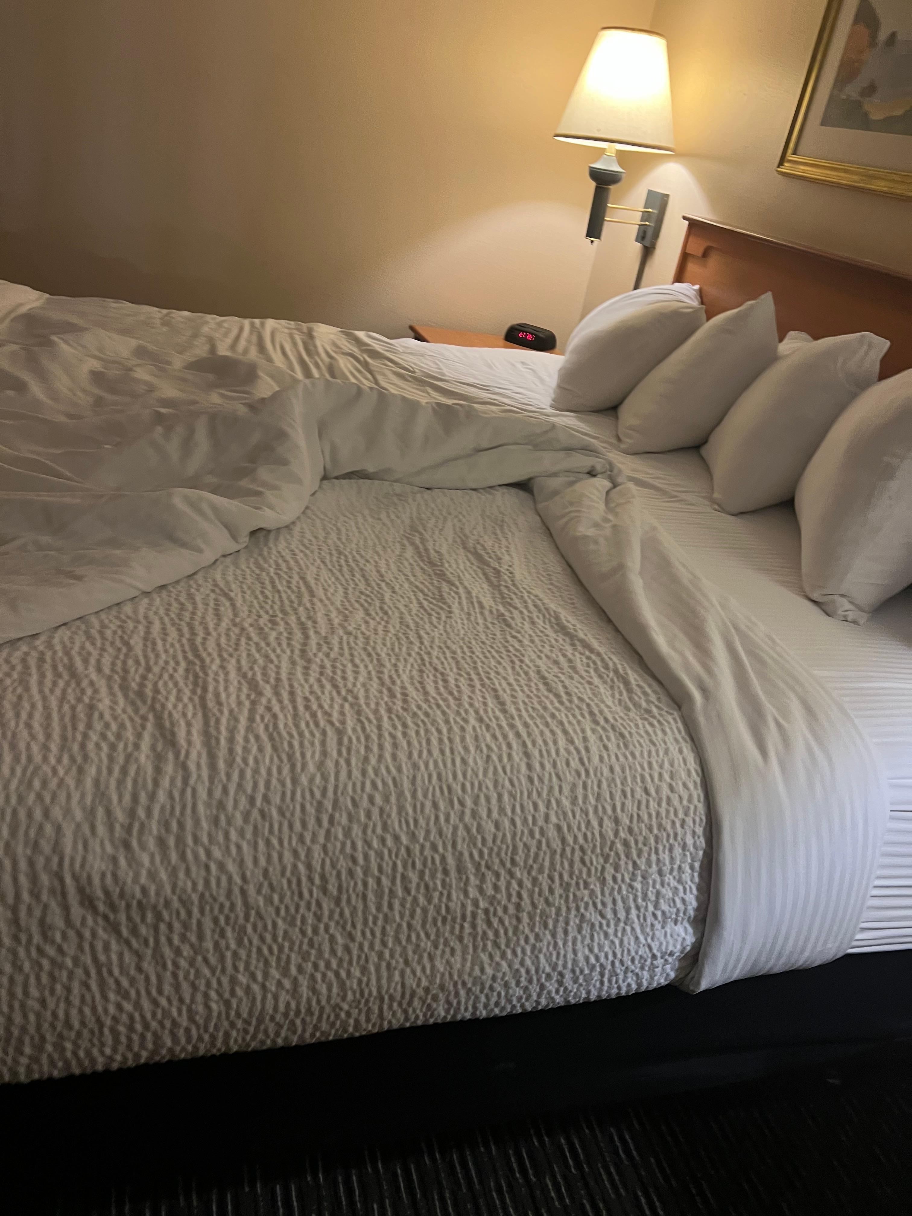 The bed after I got up to see the âdirtâ on the comforter