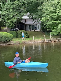 Kayaking with house in background