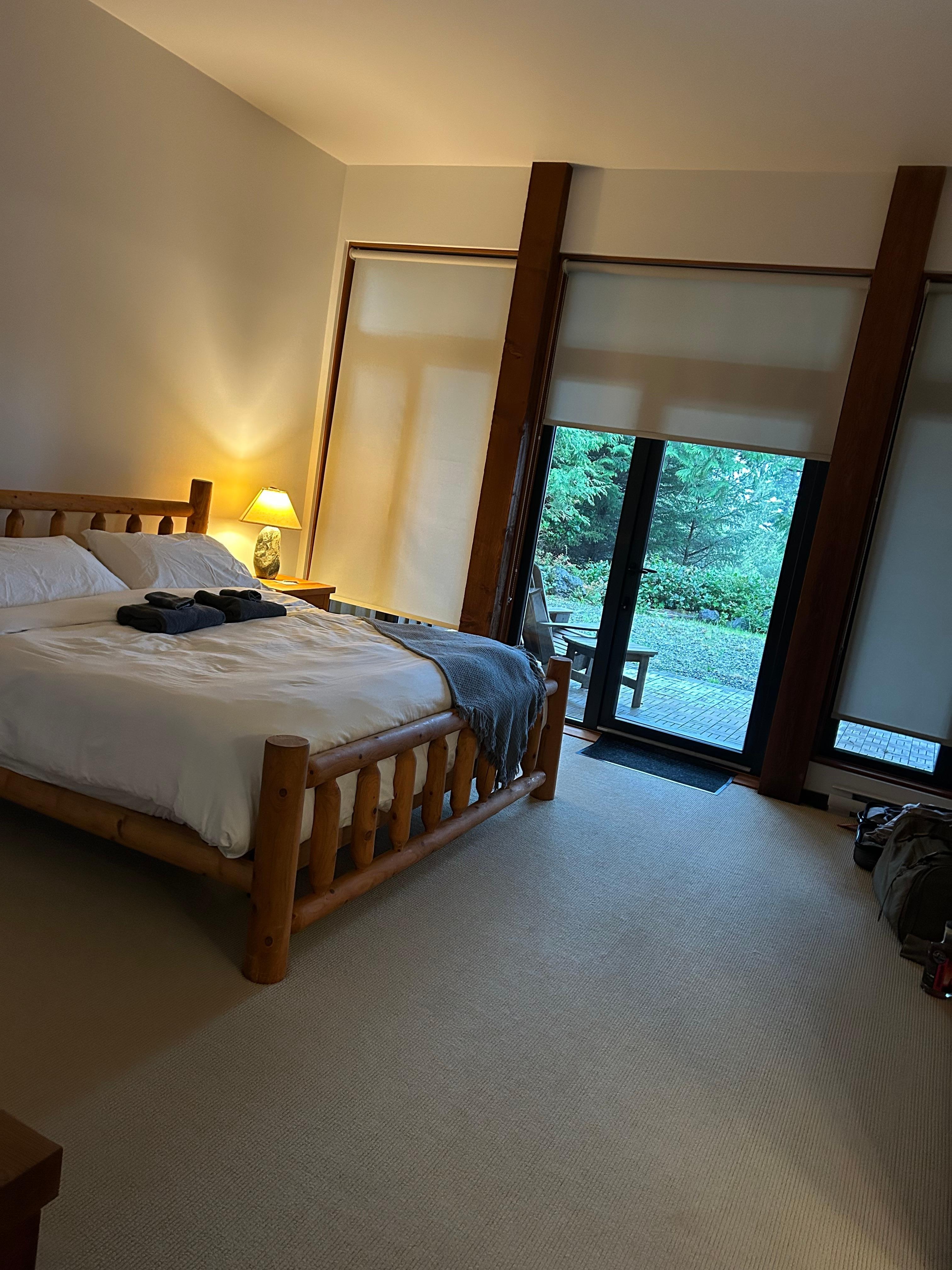 Master bedroom with patio walk out, ocean view, king bed