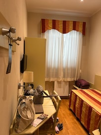 My adorable tiny room perfect for a solo traveler.