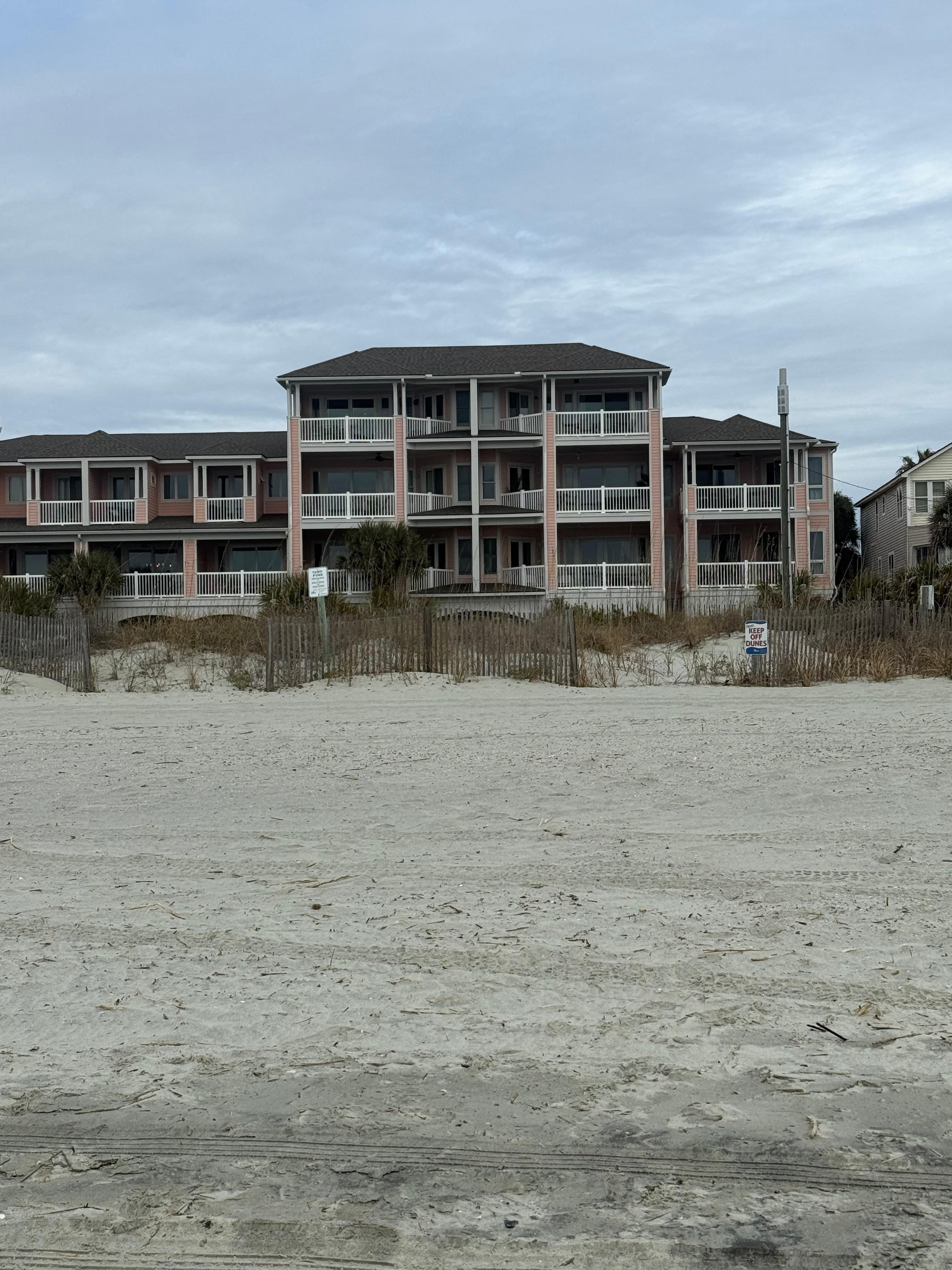 The unit is top floor, taken from the beach.