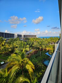 Veiw of the central courtyard and pool area from my balcony, with the beach beyond.