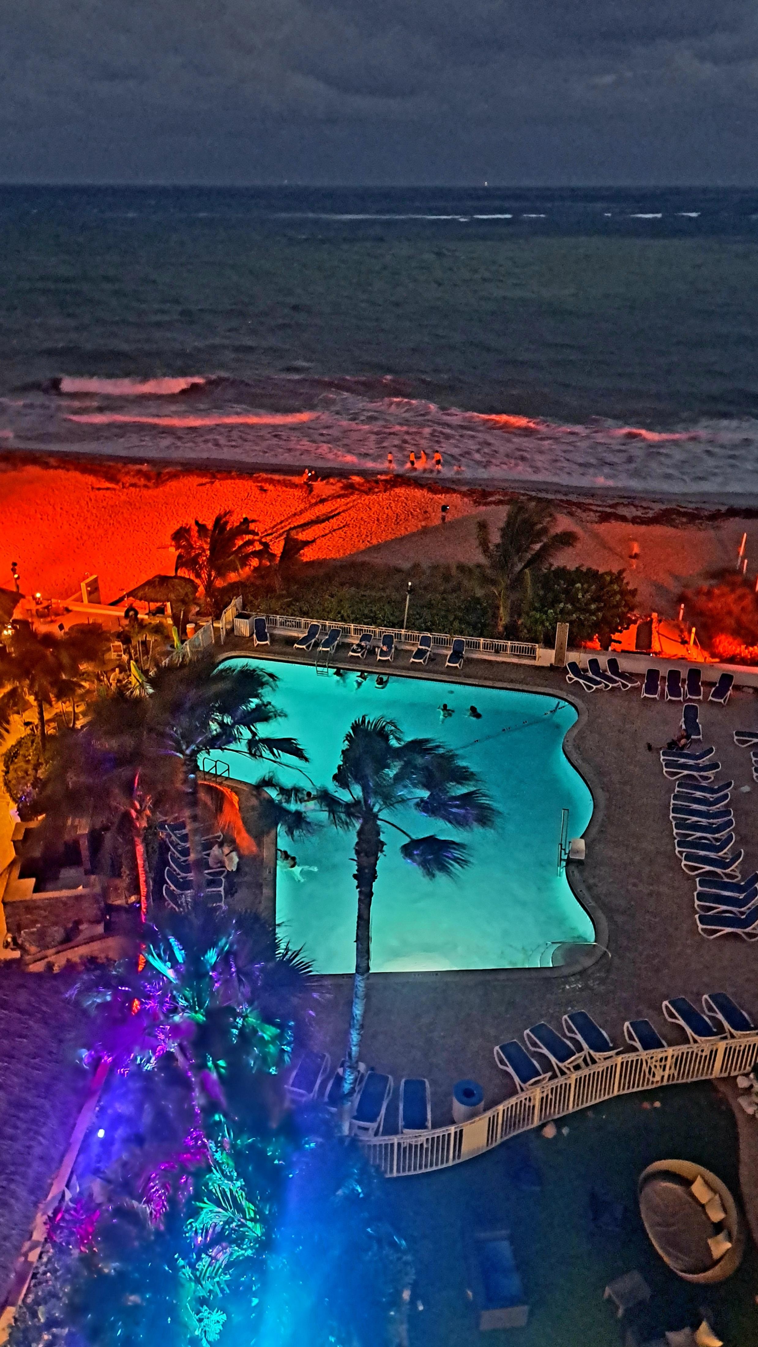 Property accent lighting adds to the coastal charm.