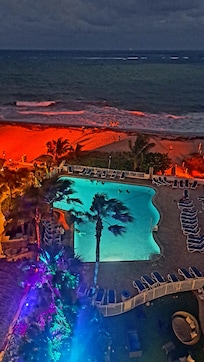 Property accent lighting adds to the coastal charm.