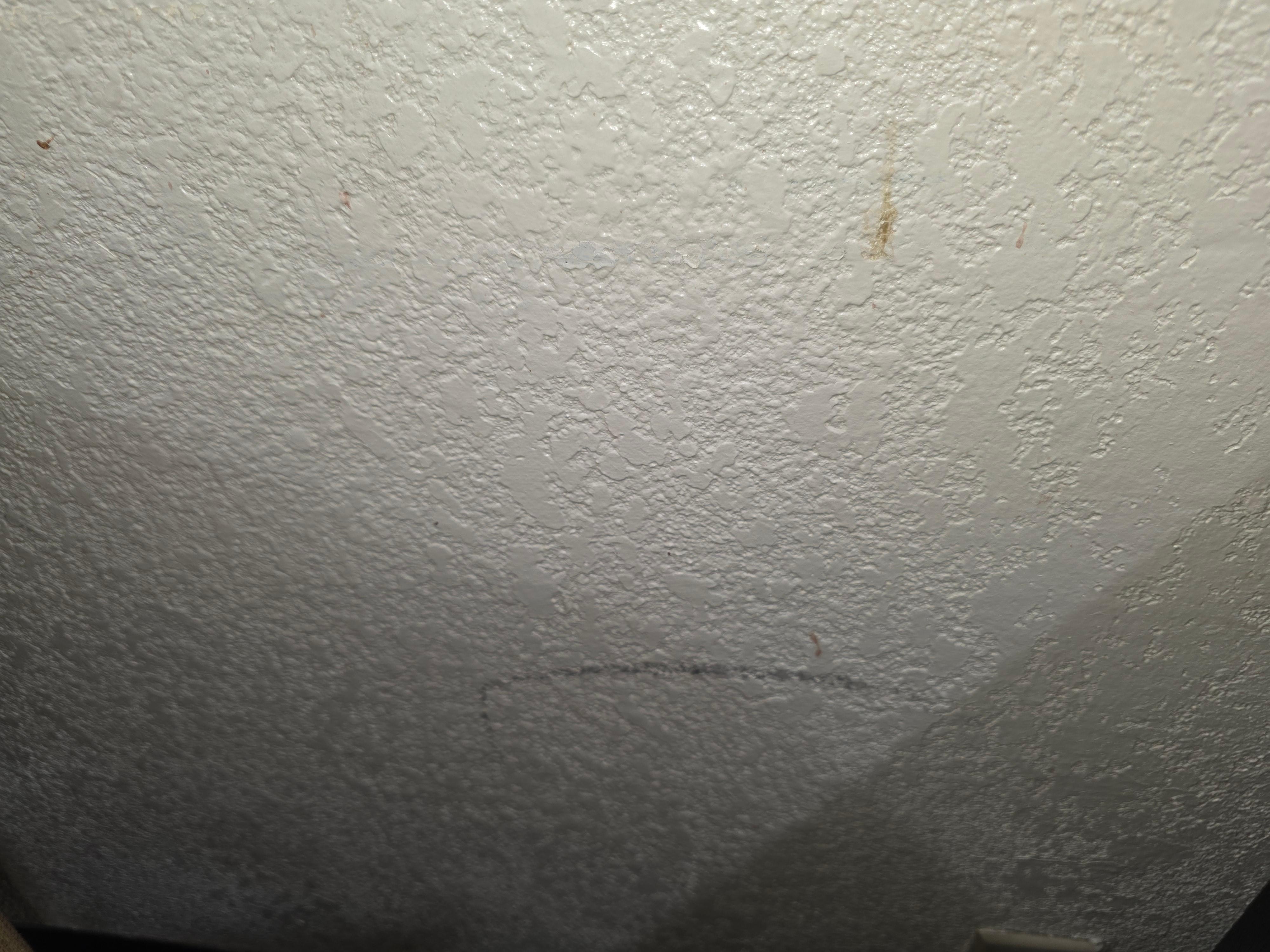 Black scuffs on the walls