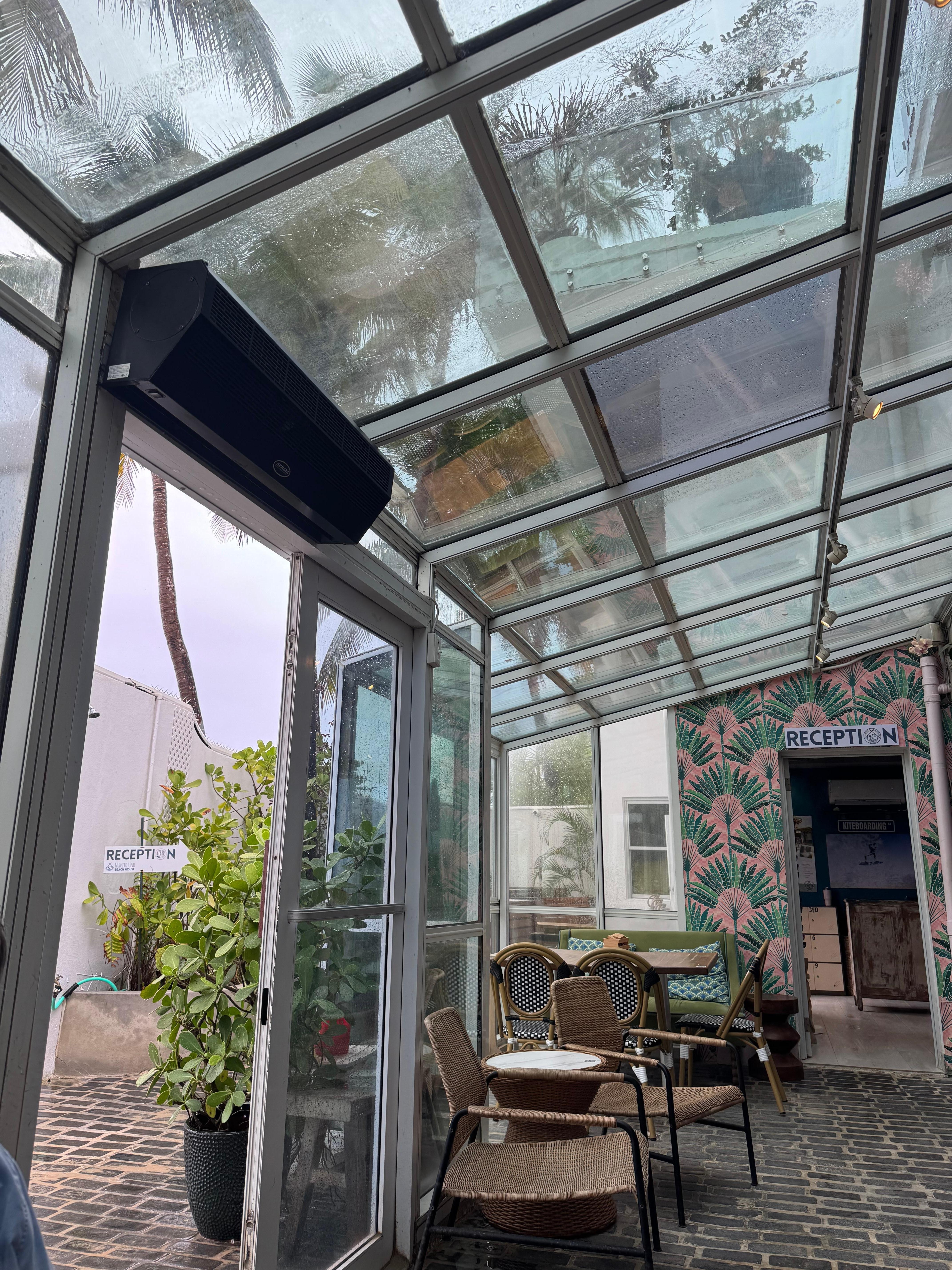Indoor seating area for eating across from bar. 