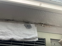 Water coming into the wall! We had to use a towel.