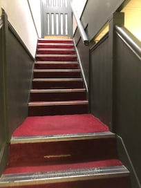 Stairs leading up to guest rooms