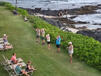 Kona Reef residents blow conch shells (Pu) each day at sunset as seen from the Lanai.