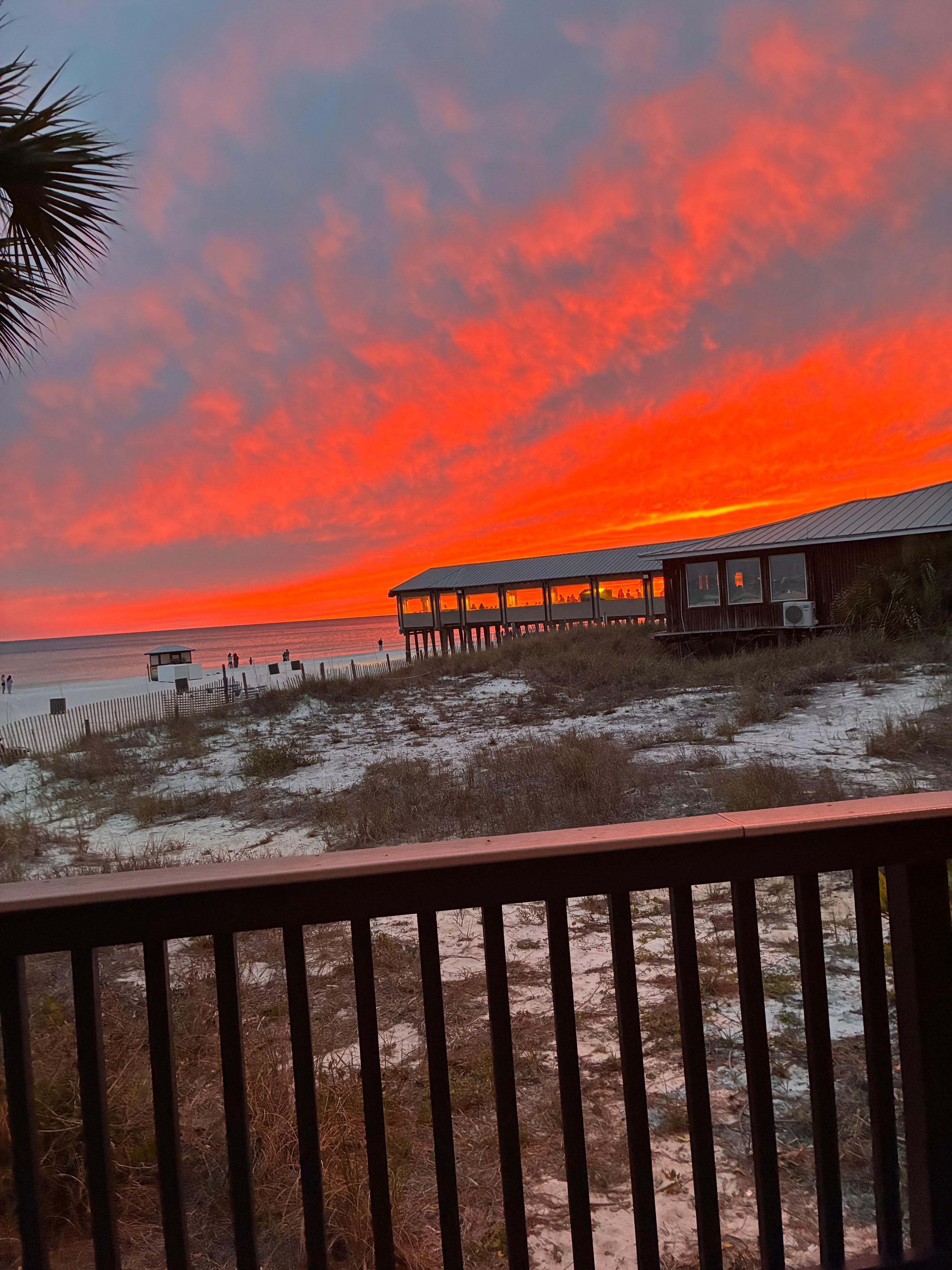 Sunset behind Pineapple Willys, view from the west pool 
