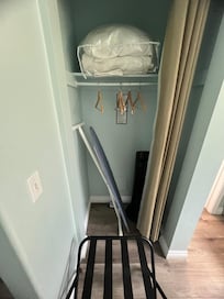 Bent ironing board that my iron kept tipping over when trying to stand it up. Fire hazard.