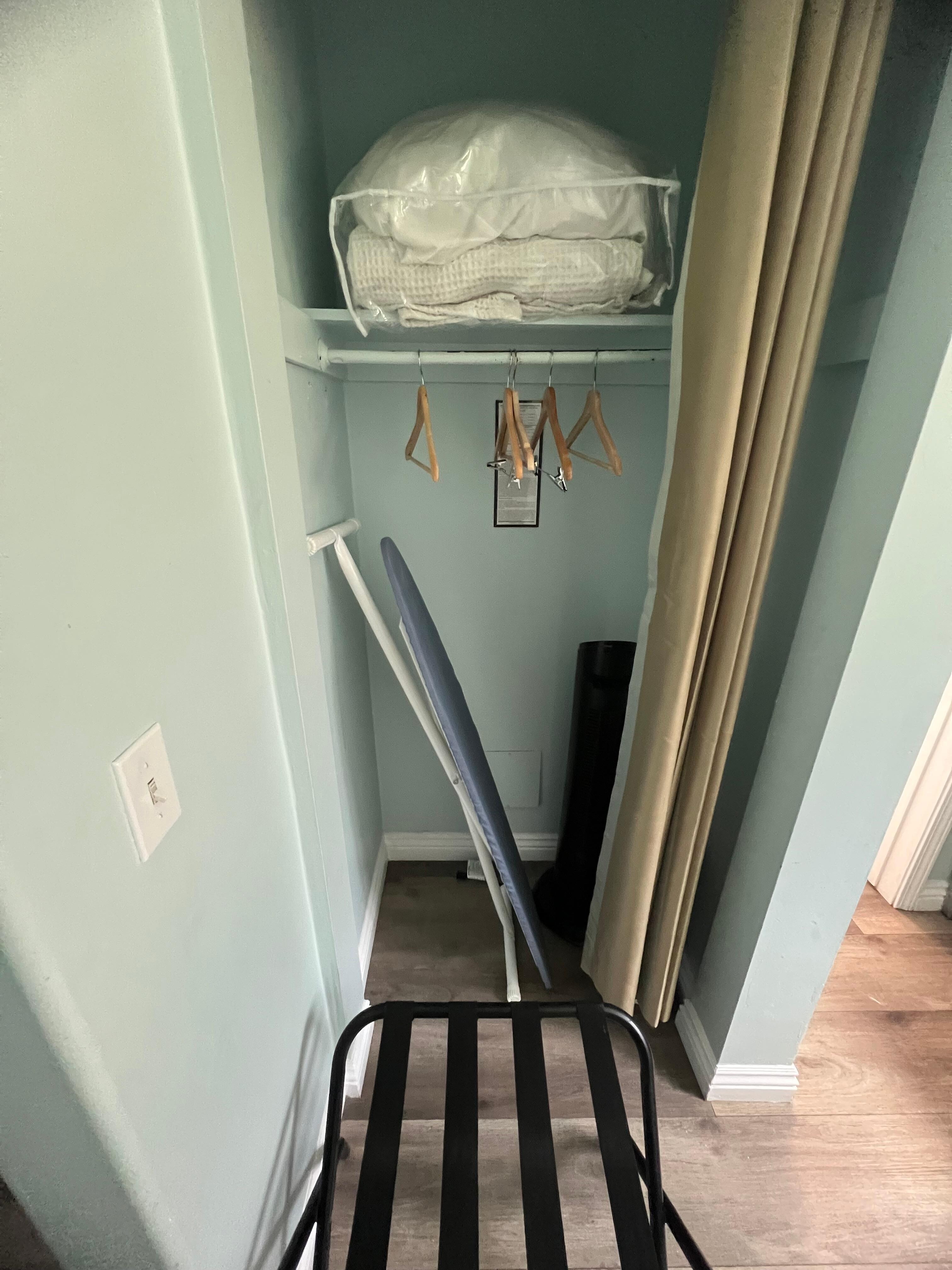 Bent ironing board that my iron kept tipping over when trying to stand it up. Fire hazard. 