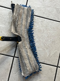 The nasty dust mop that was used to clean the unit. This was like this when we entered the unit. We had to buy our own mop & bucket.