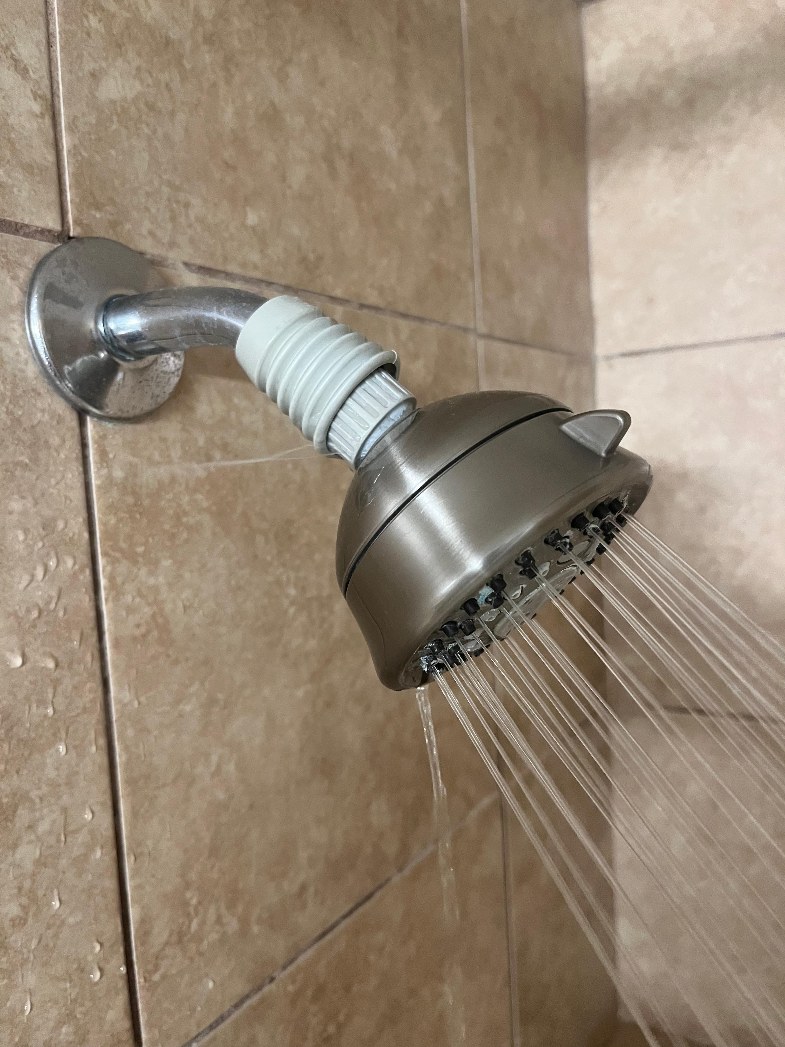 The showerhead was leaking and to fix it. They put a rubber cover on it, so just leaks down the head.