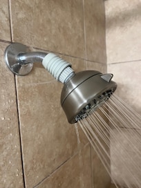 The showerhead was leaking and to fix it. They put a rubber cover on it, so just leaks down the head.
