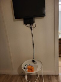 small unstable table. No place to put luggage except the floor.