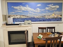 Has a fireplace and dining room table