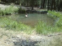 Me soaking in hot springs in beautiful mountains of Jemez Springs NM.