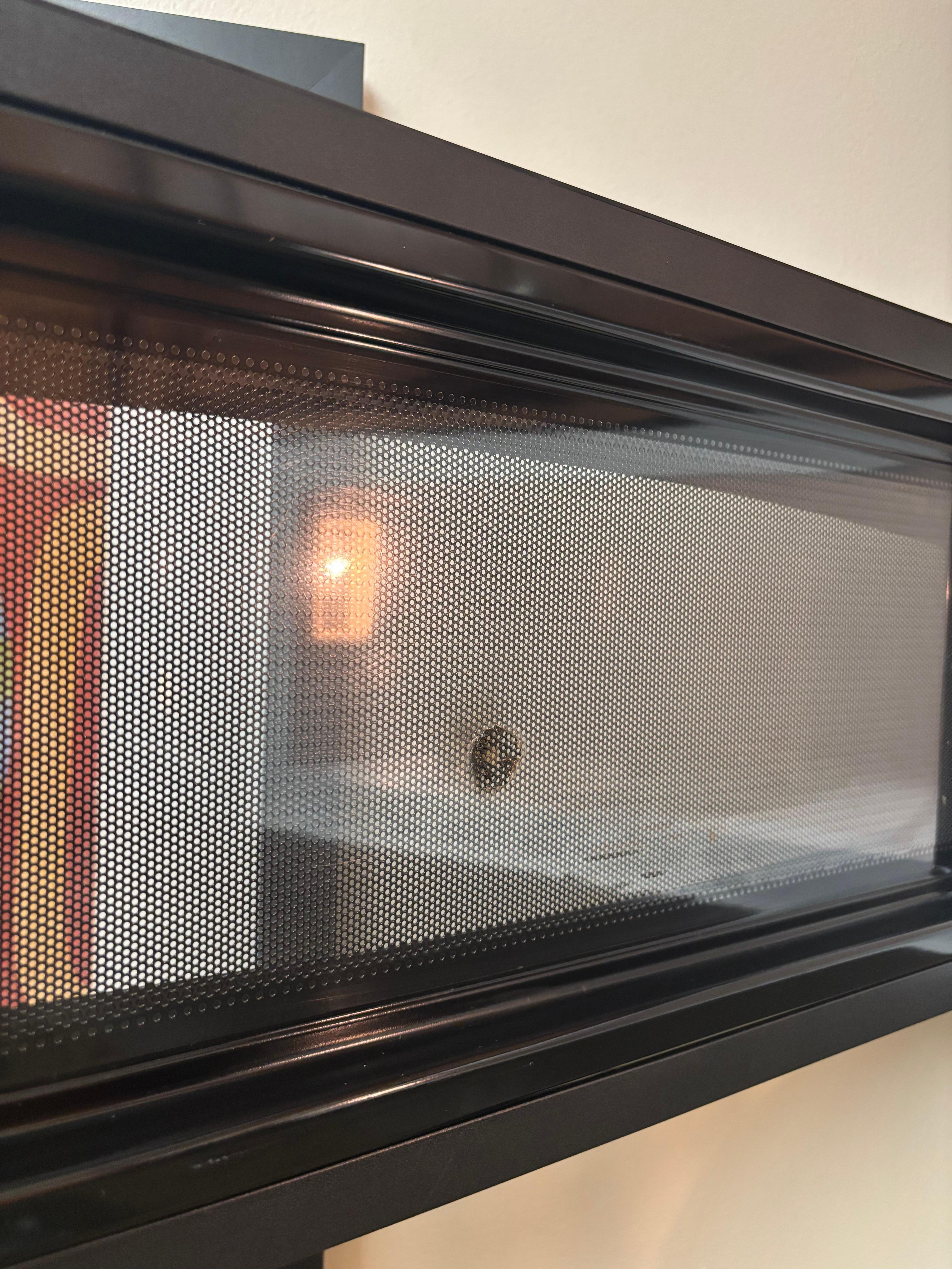 BURNT HOLE thru microwave lol